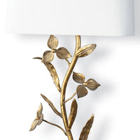 Trillium Shaded Sconce with antique gold leaf branches and a natural linen shade.
