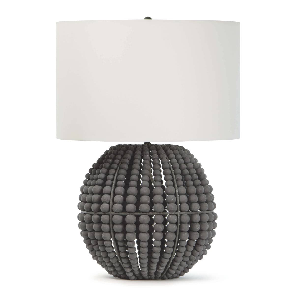 Tropez table lamp with a round base of distressed charcoal grey wooden beads and a white linen shade.