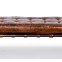 Tufted chestnut leather gallery bench with a classic design and generous 6.5-foot length.