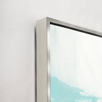 Close-up of Variance VI Giclee Canvas Painting, showing a silver floating frame and light blue brushstrokes.