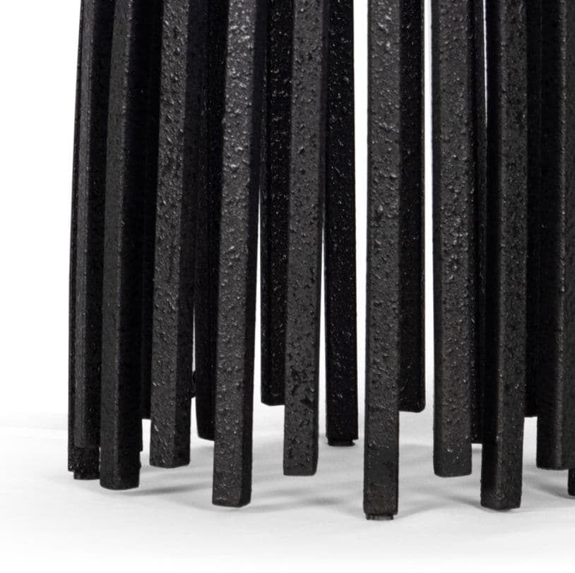 Close-up of the Webbed Table Lamp base, featuring sculpted blackened iron metal rods with a textured finish.