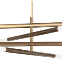 Modern Wick Chandelier in natural brass with four linear arms and frosted acrylic bulb covers.