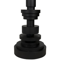 Wilton floor lamp base, black steel, featuring stacked variegated metal discs.