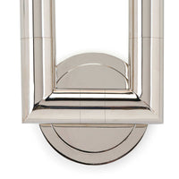 Polished nickel Wolfe Sconce with two cylindrical arms and a sleek, modern design.