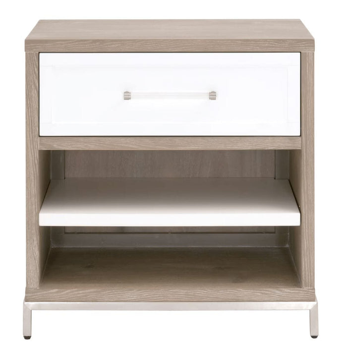 Wrenn natural gray acacia veneer nightstand with matte white drawer, clear acrylic handle, and metal base.