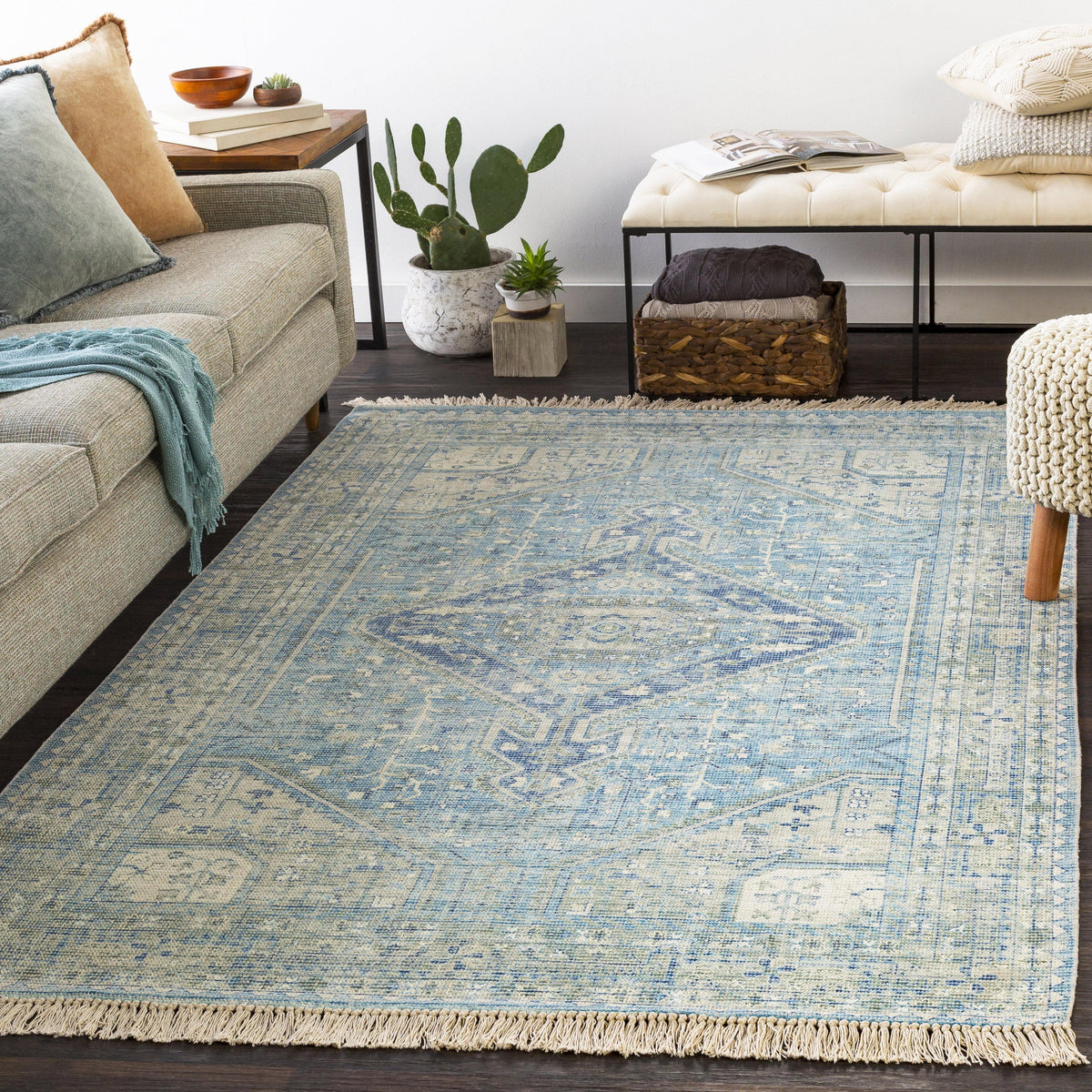 Zainab Sky Blue hand-woven cotton-polyester rug with traditional design and fringe.