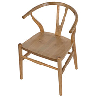 Zicara Natural Wood Dining Chair with curved back, hand-carved details, and sungkai wood finish.