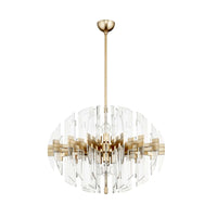 Zion Aged Brass & Acrylic Oval Chandelier with modern transparent shade and gold accents.